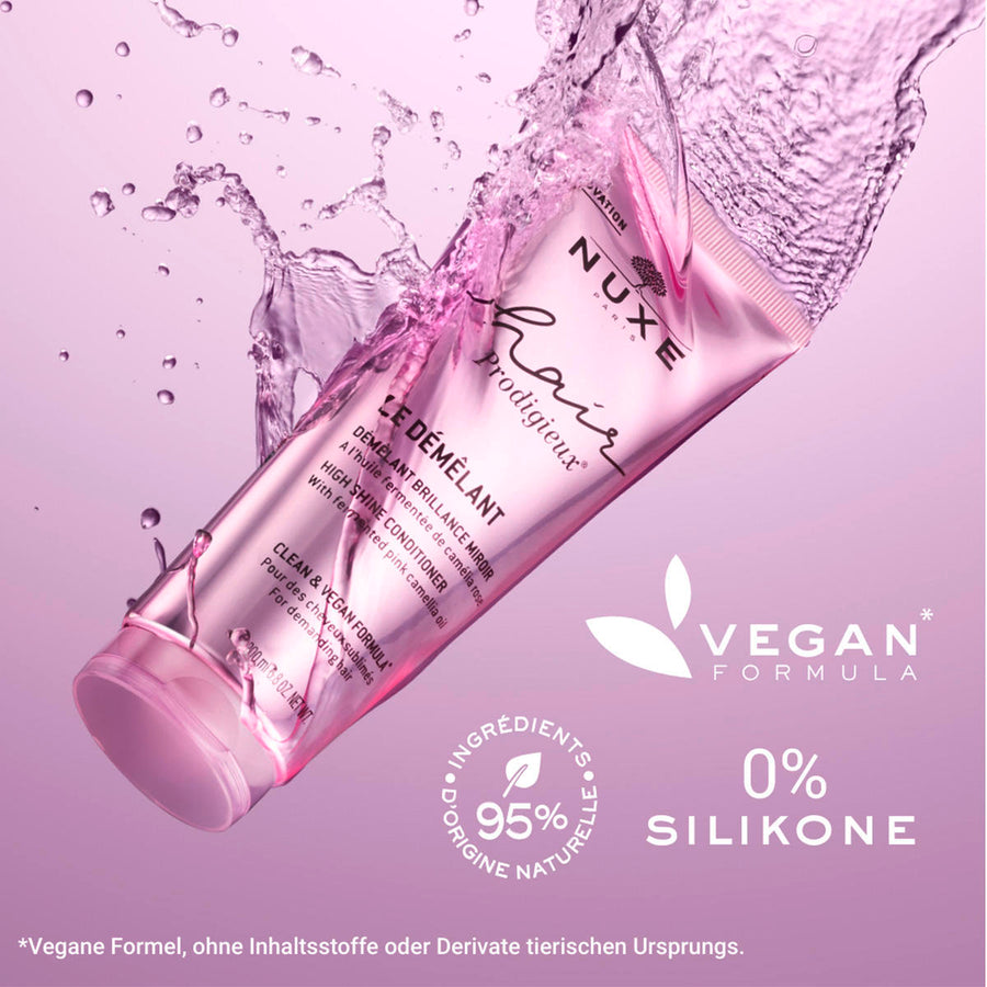 Su textura de bálsamo con la fragancia mítica de Huile Prodigieuse envuelve el cabello en un ritual sensorial increíble. El cabello queda lleno de brillo y con un adictivo tacto sedoso.